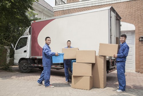 Prepared boxes and furniture ready for man with van collection