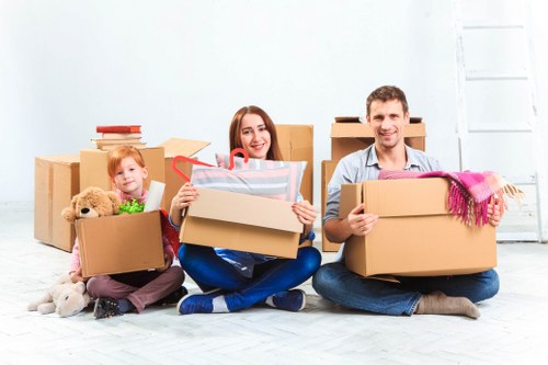 Removal van and moving boxes for a home move in Palmers Green
