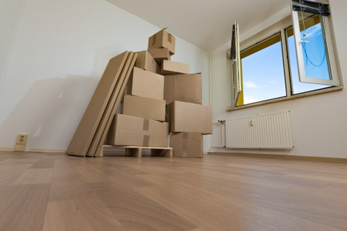 Moving boxes and household items loaded for a Palmers Green removals van