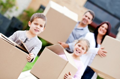 Packed boxes and furniture loaded into a removal van