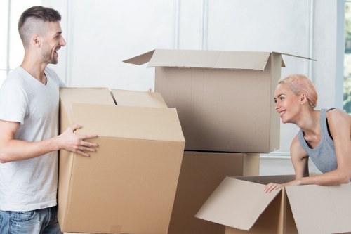Careful loading of household furniture for pick-up in Palmers Green