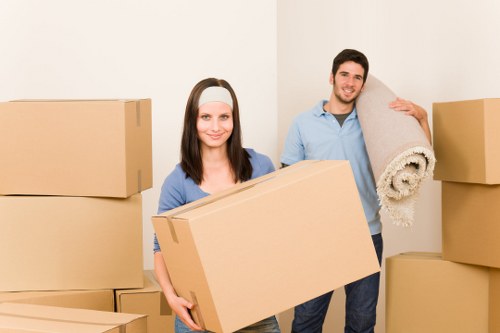 Preparing belongings and packing for a Palmers Green moving truck service
