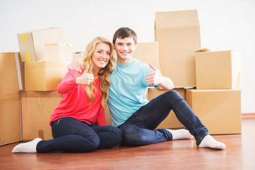 Packed household items and furniture prepared for transport during a home removal