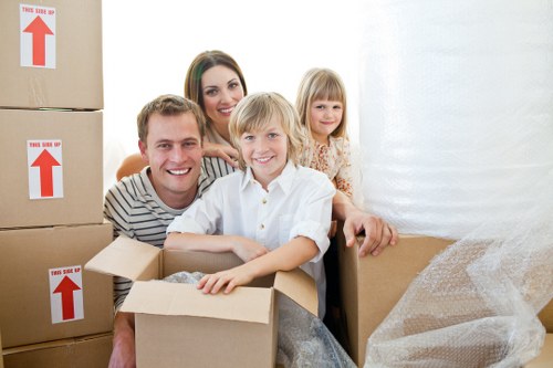 Professional movers loading furniture for a Palmers Green house move