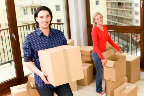 Boxes and furniture prepared for a home relocation in Palmers Green